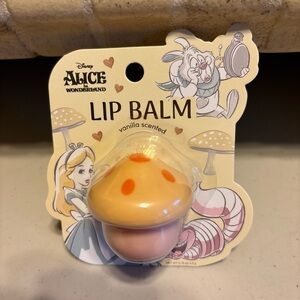 Disney Alice in Wonderland Lip Balm. In container new
